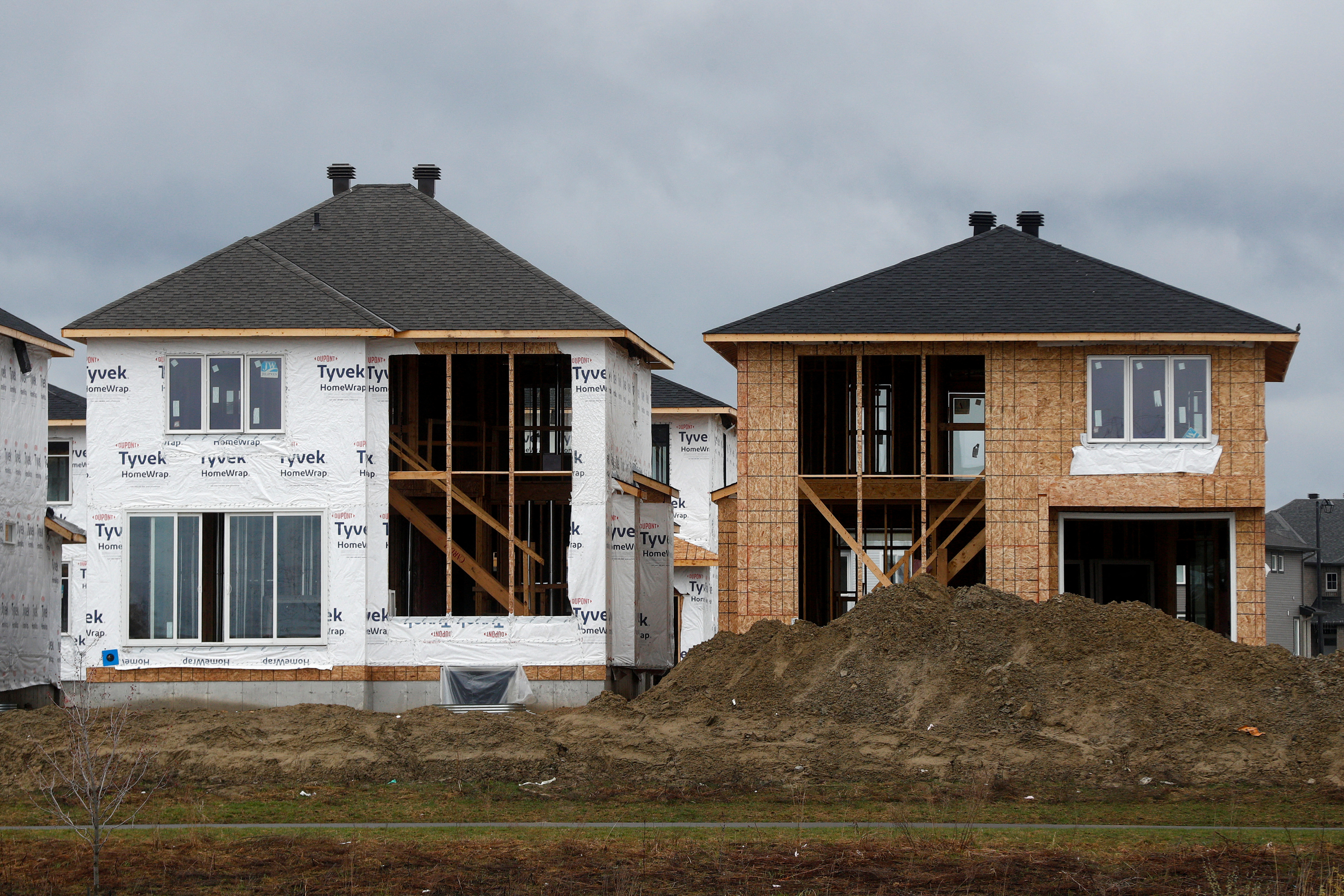 FILE PHOTO: Houses are seen for sale and under construction in a neighbourhood of Ottawa