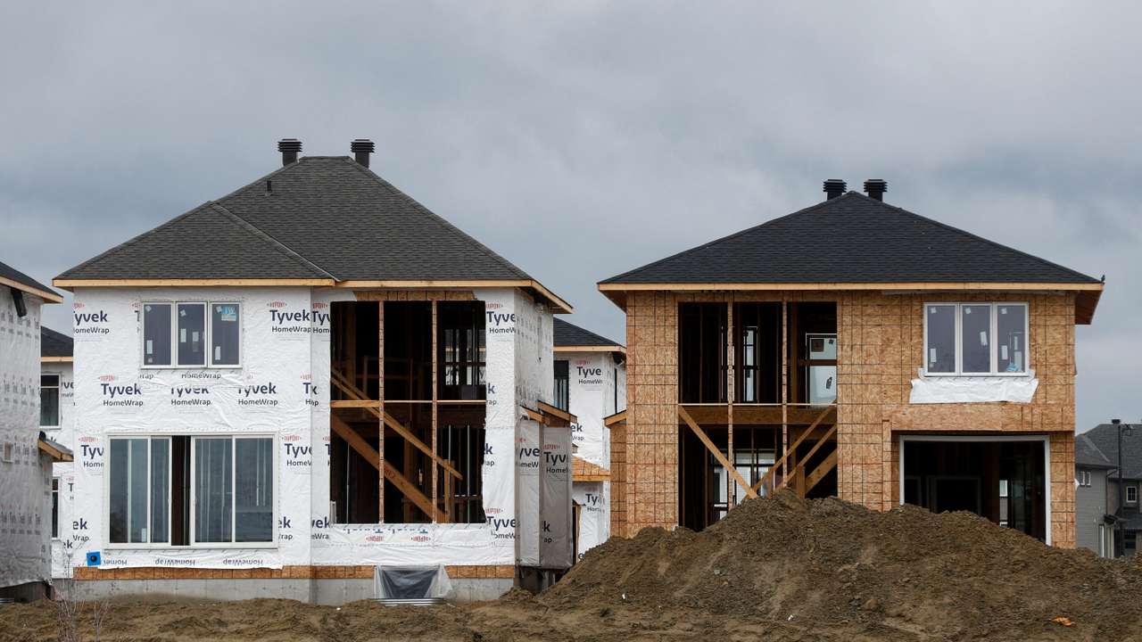 FILE PHOTO: Houses are seen for sale and under construction in a neighbourhood of Ottawa
