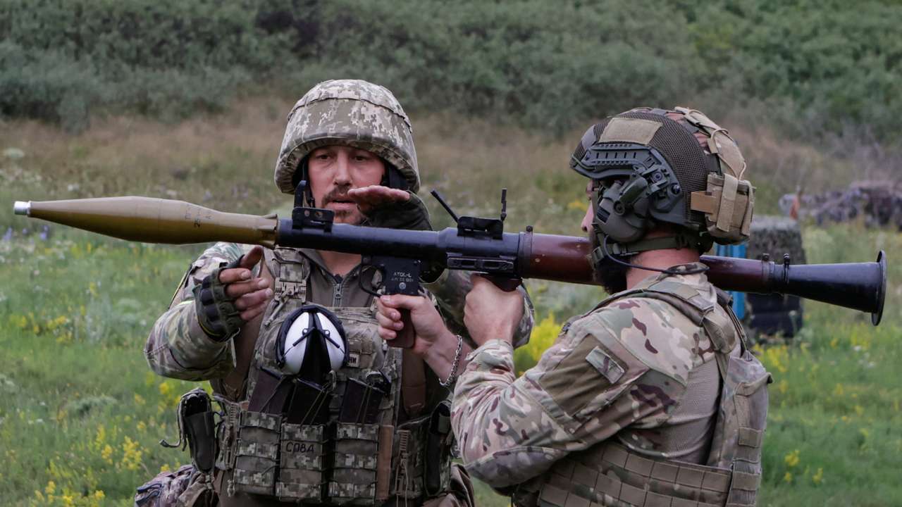 Ukrainian servicemen attend military drills at a training ground in Kharkiv region