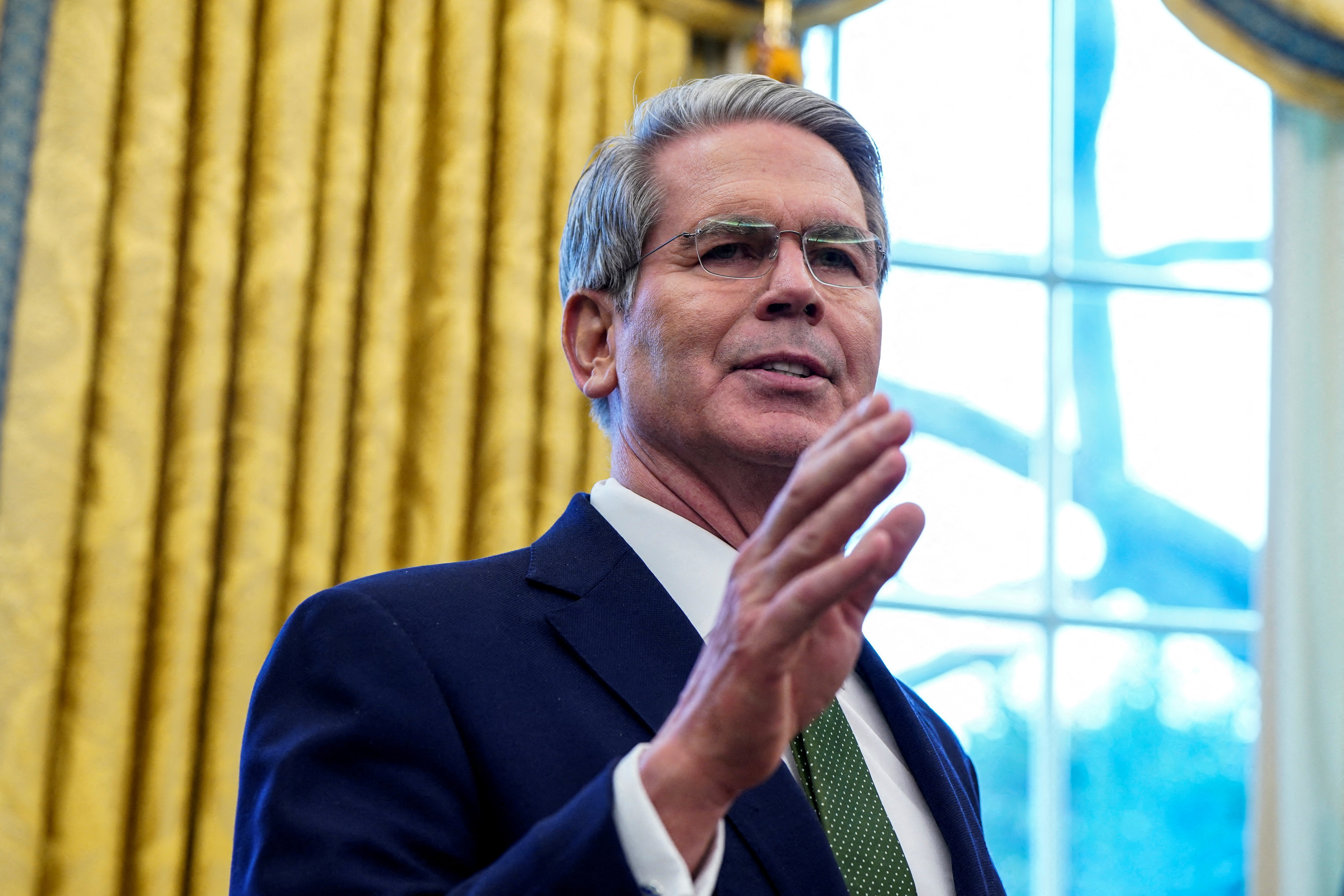 FILE PHOTO: U.S. Secretary of the Treasury Scott Bessent speaks, at the White House