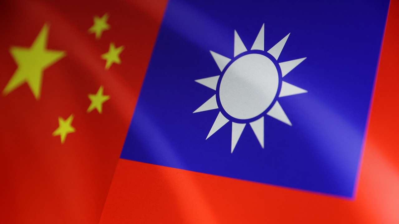 Illustration shows Chinese and Taiwanese flags