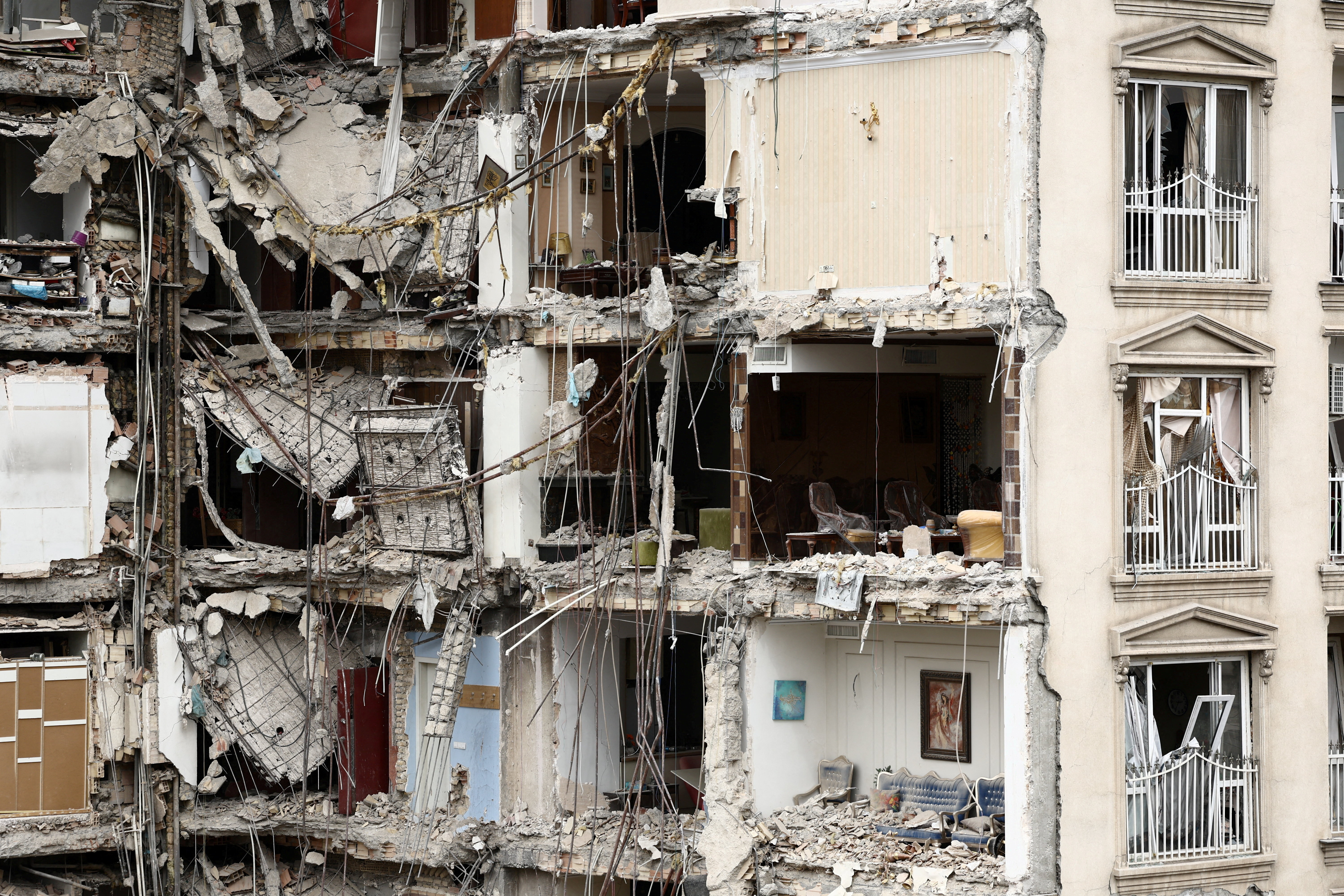 A view of a residential building damaged by a strike, Tehran