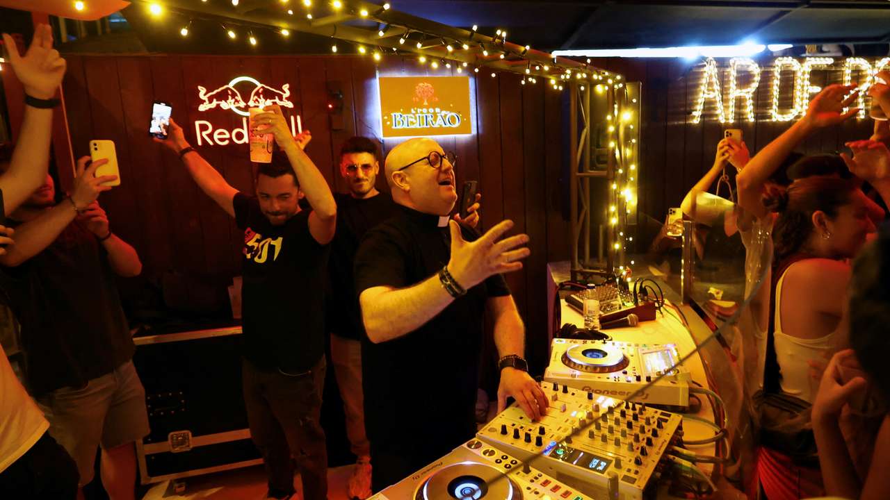 DJ priest Guilherme plays music in the parish bar of Laundos, Povoa do Varzim