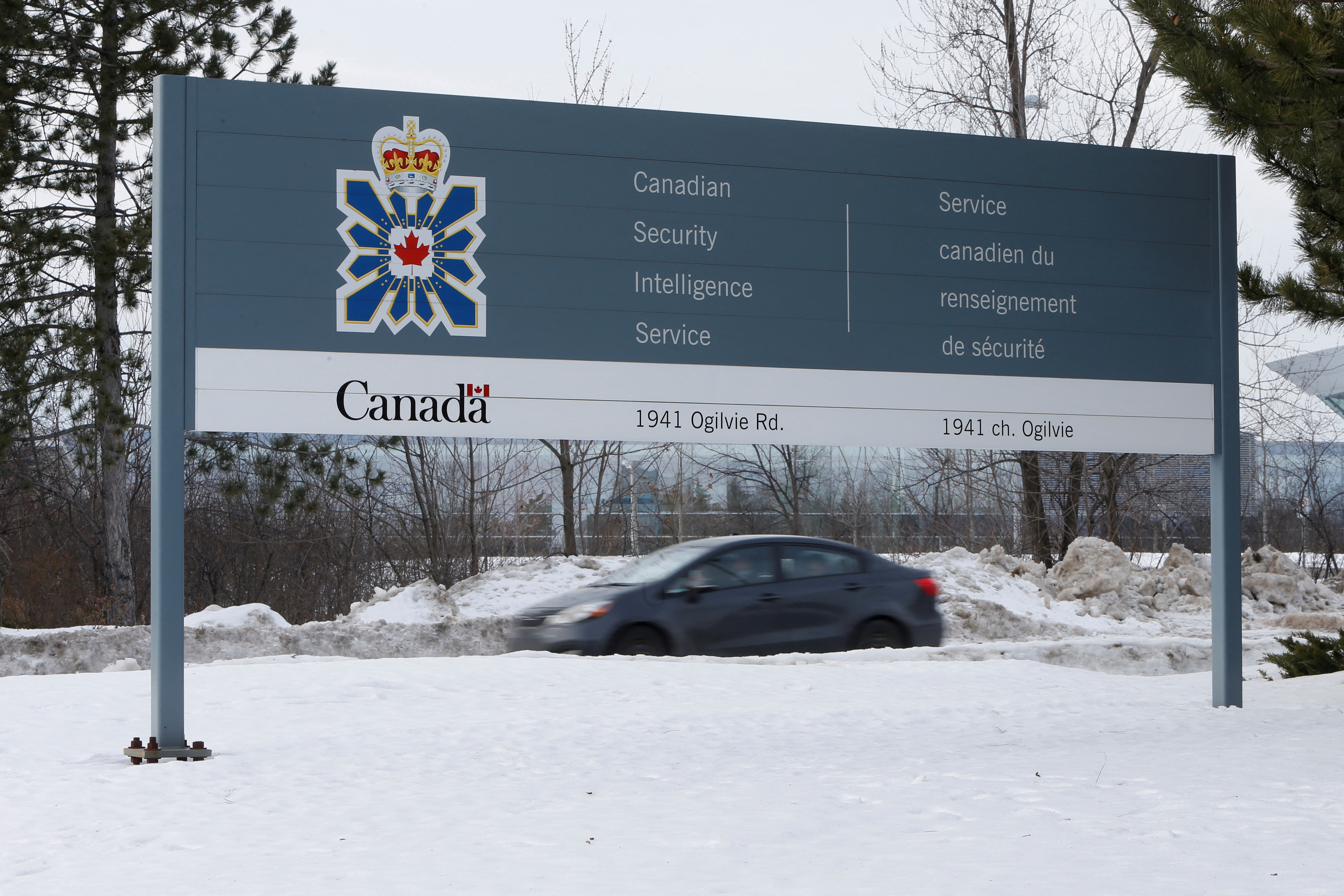 FILE PHOTO: A vehicle passes a sign outside the CSIS headquarters in Ottawa