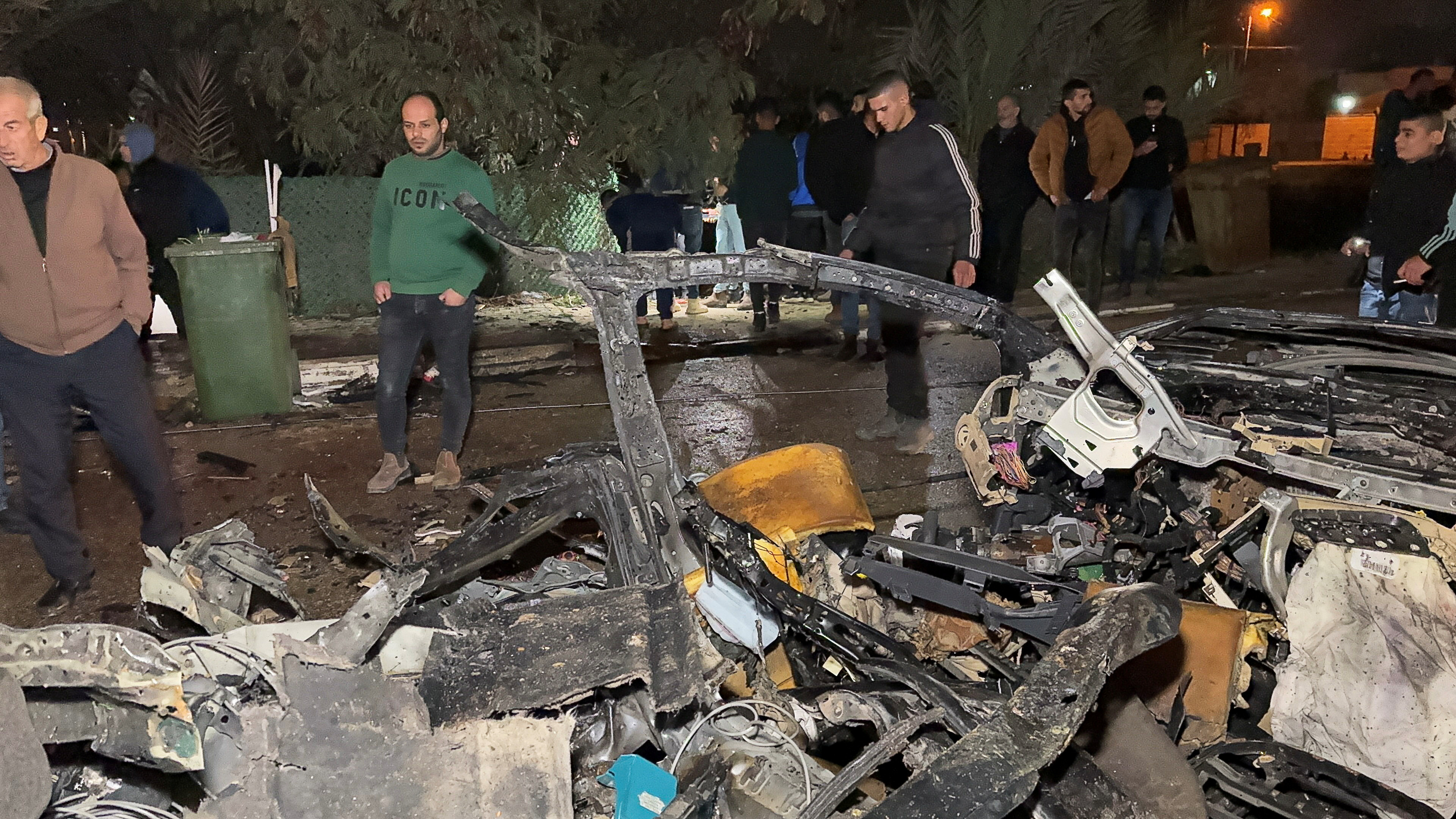 Aftermath of a deadly Israeli strike on a car, near Jenin