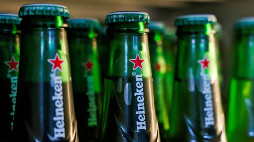 FILE PHOTO: Bottles of Heineken beer are displayed in a cooler at a bar in Gurugram