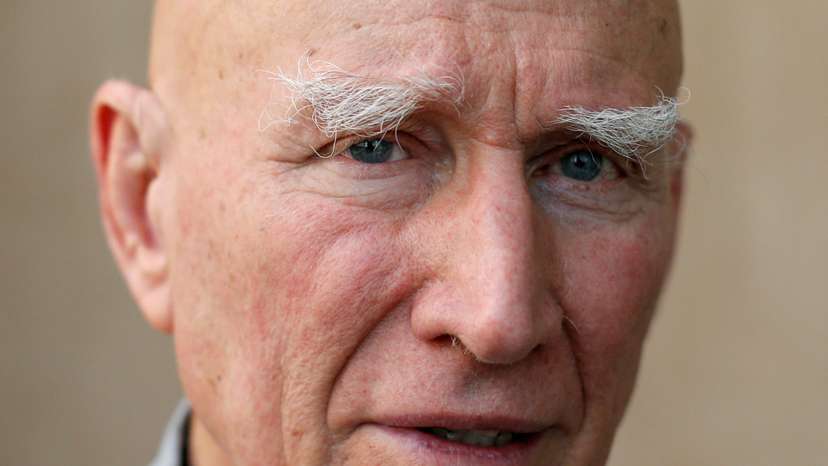 FILE PHOTO: Brazilian photographer Sebastiao Salgado poses for a portrait after an interview with Reuters in Bangkok