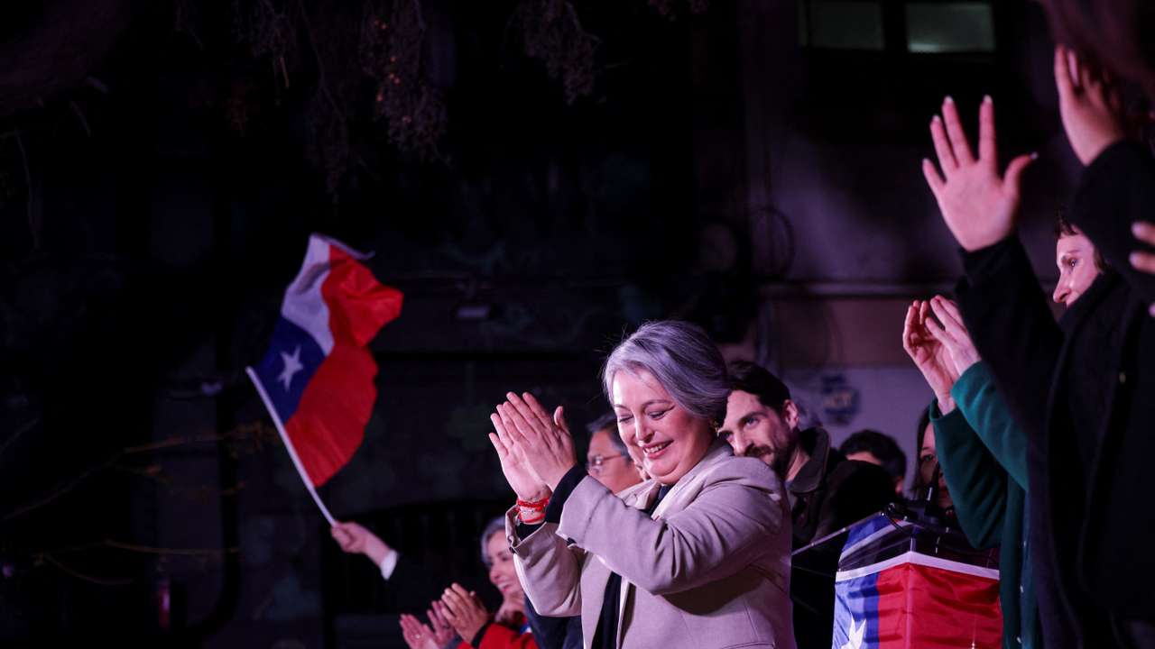 Former Labor Minister and member of Chile's communist party, Jeannette Jara, reacts after winning the presidential primaries in Santiago
