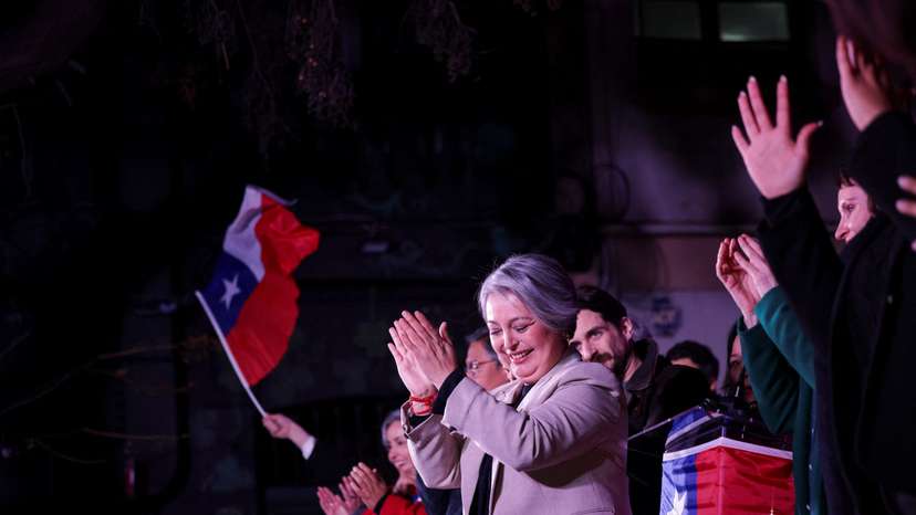 Former Labor Minister and member of Chile's communist party, Jeannette Jara, reacts after winning the presidential primaries in Santiago