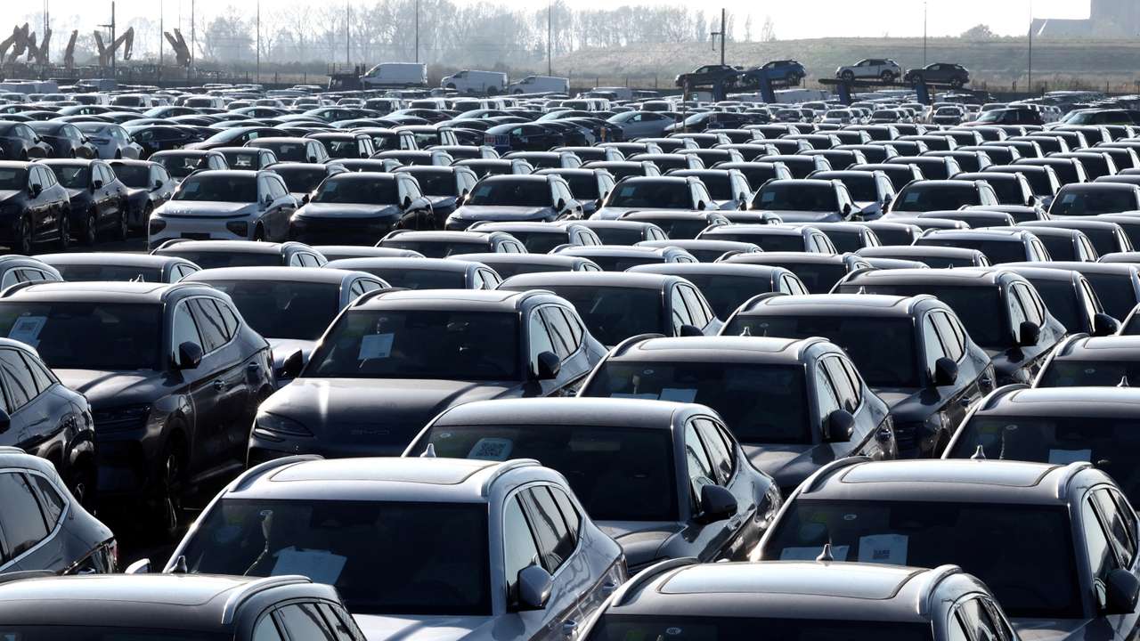 FILE PHOTO: New cars, among them new China-built electric vehicles of the company BYD, are seen parked in the port of Zeebrugge