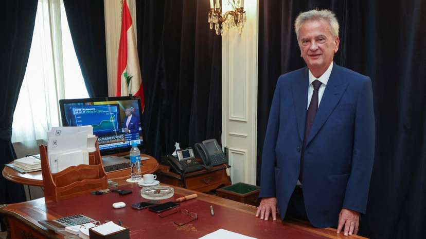 Longtime chief of Lebanon's Central Bank Riad Salameh, poses as he leaves office after a 30-year tenure, at Lebanon's Central Bank building in Beirut