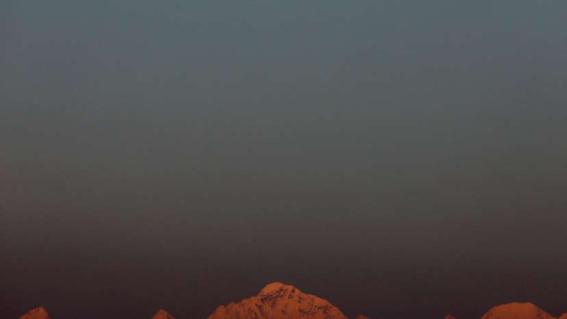 FILE PHOTO: Mount Everest, the world's highest mountain, and other peaks of the Himalayan range are seen during sunset from Kathmandu