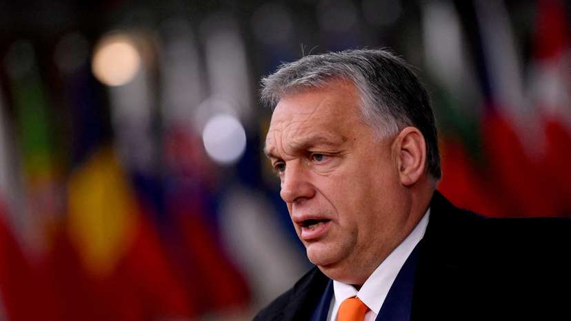 FILE PHOTO: Hungarian Prime Minister Viktor Orban speaks on arrival for an EU summit in Brussels