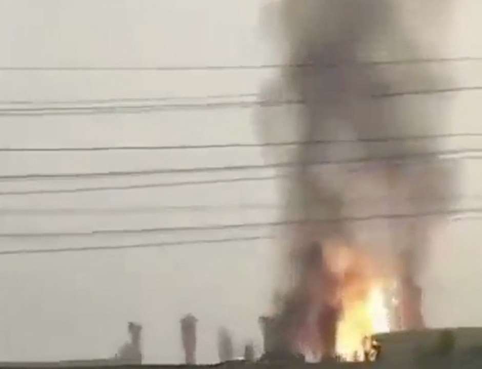 A fire burns at South Pars gas field, in Tonbak