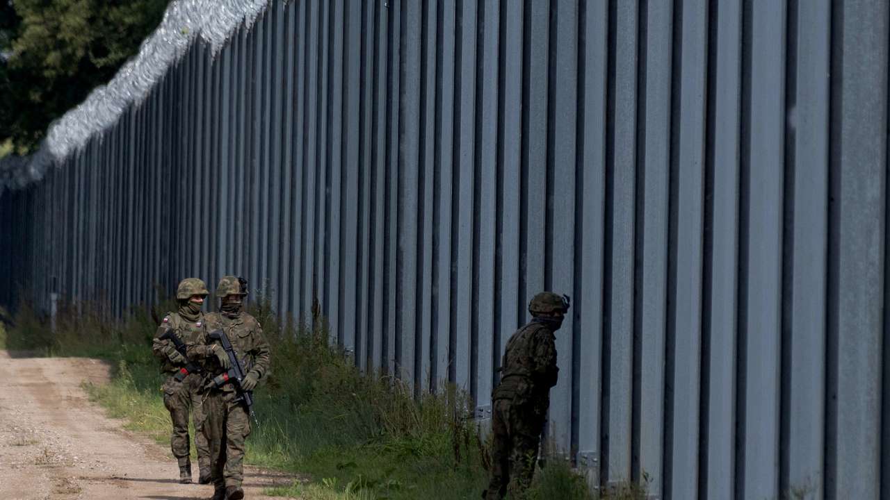Polish soldiers patrol the Polish-Belarusian border