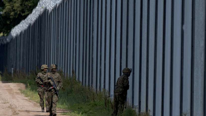 Polish soldiers patrol the Polish-Belarusian border