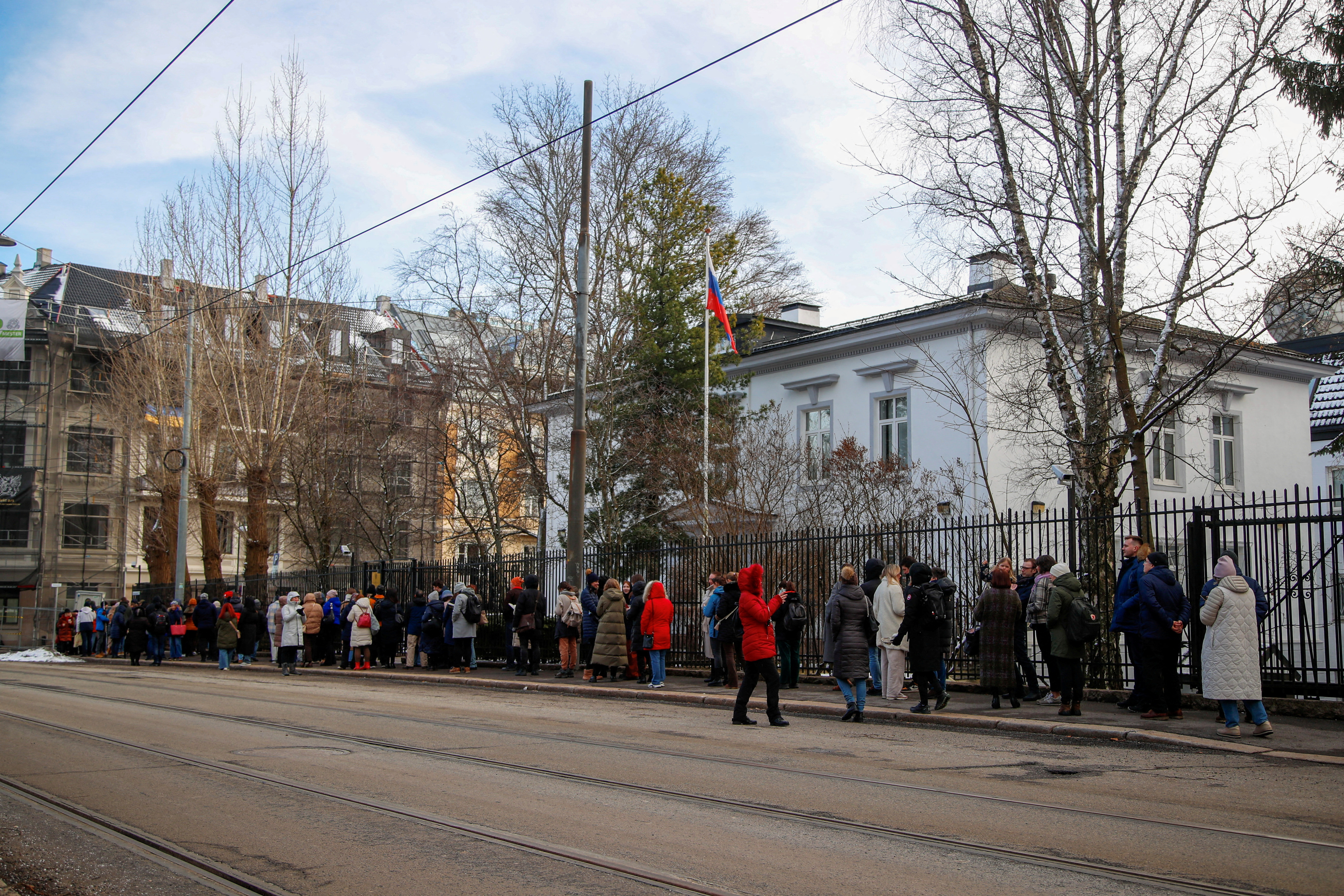 FILE PHOTO: Russians stand in a queue  to vote, outside the Russian embassy in Oslo