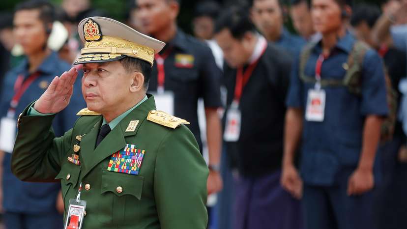 Myanmar's Commander in Chief Senior General Min Aung Hlaing salutes as he attends an event marking Martyrs' Day at Martyrs' Mausoleum in Yangon