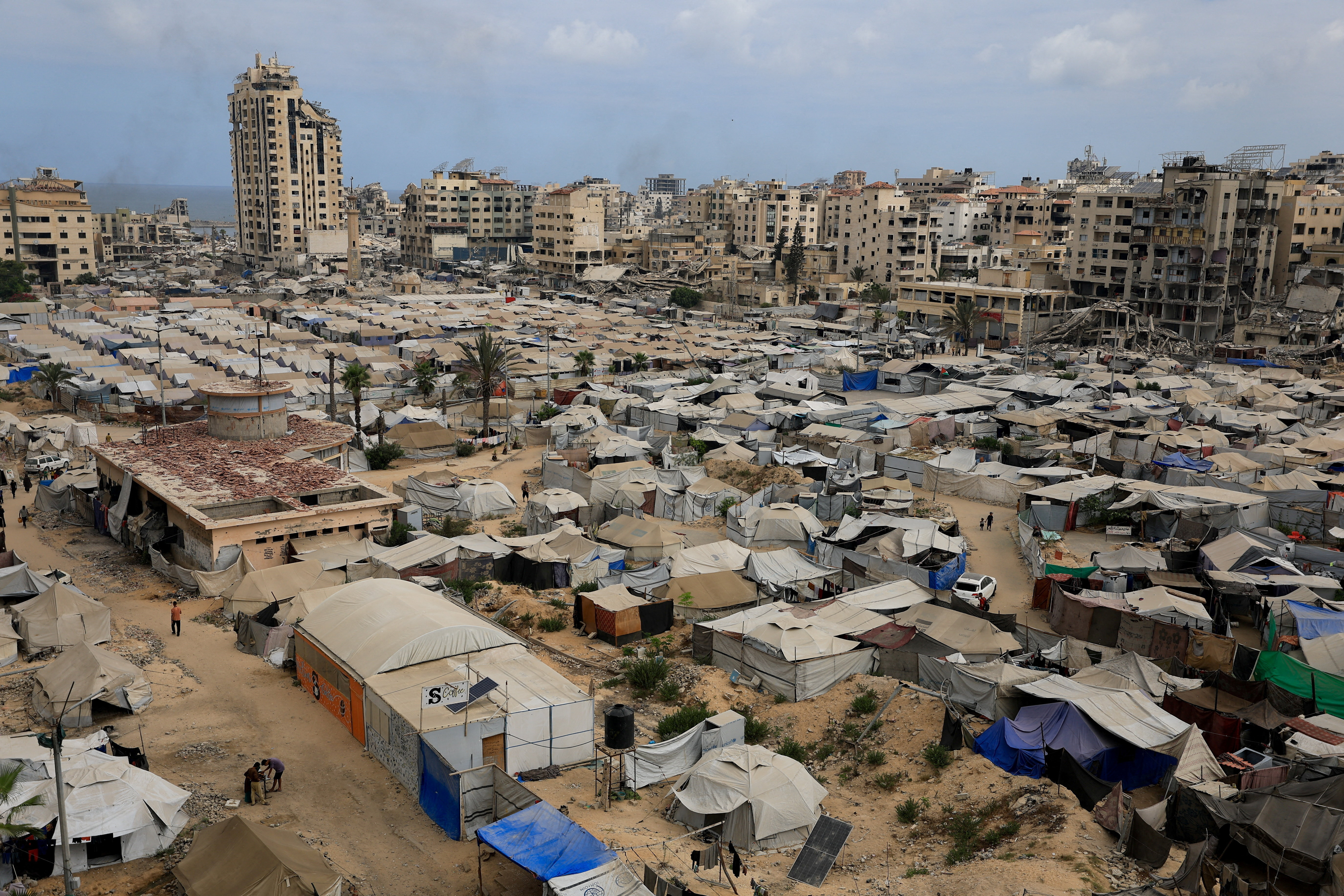 Displaced Palestinians shelter in tents in Gaza City