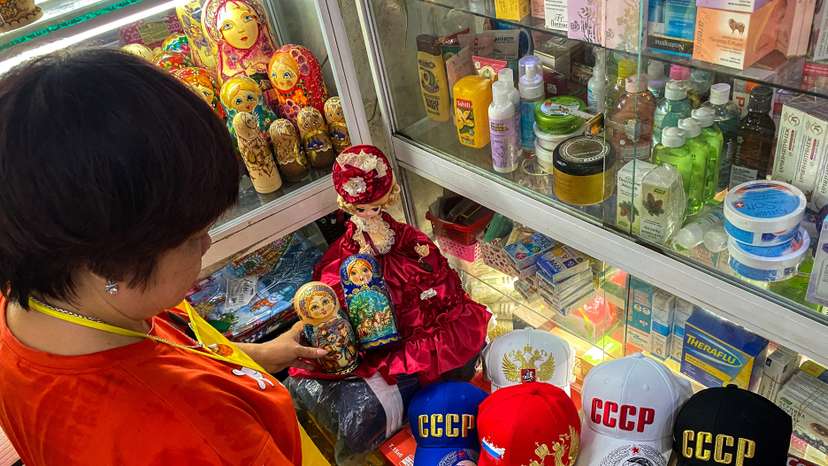Nguyen Thi Hong Van, a collector and seller of Russian souvenirs who lived and worked in Russia for 20 years, at her shop in Hanoi