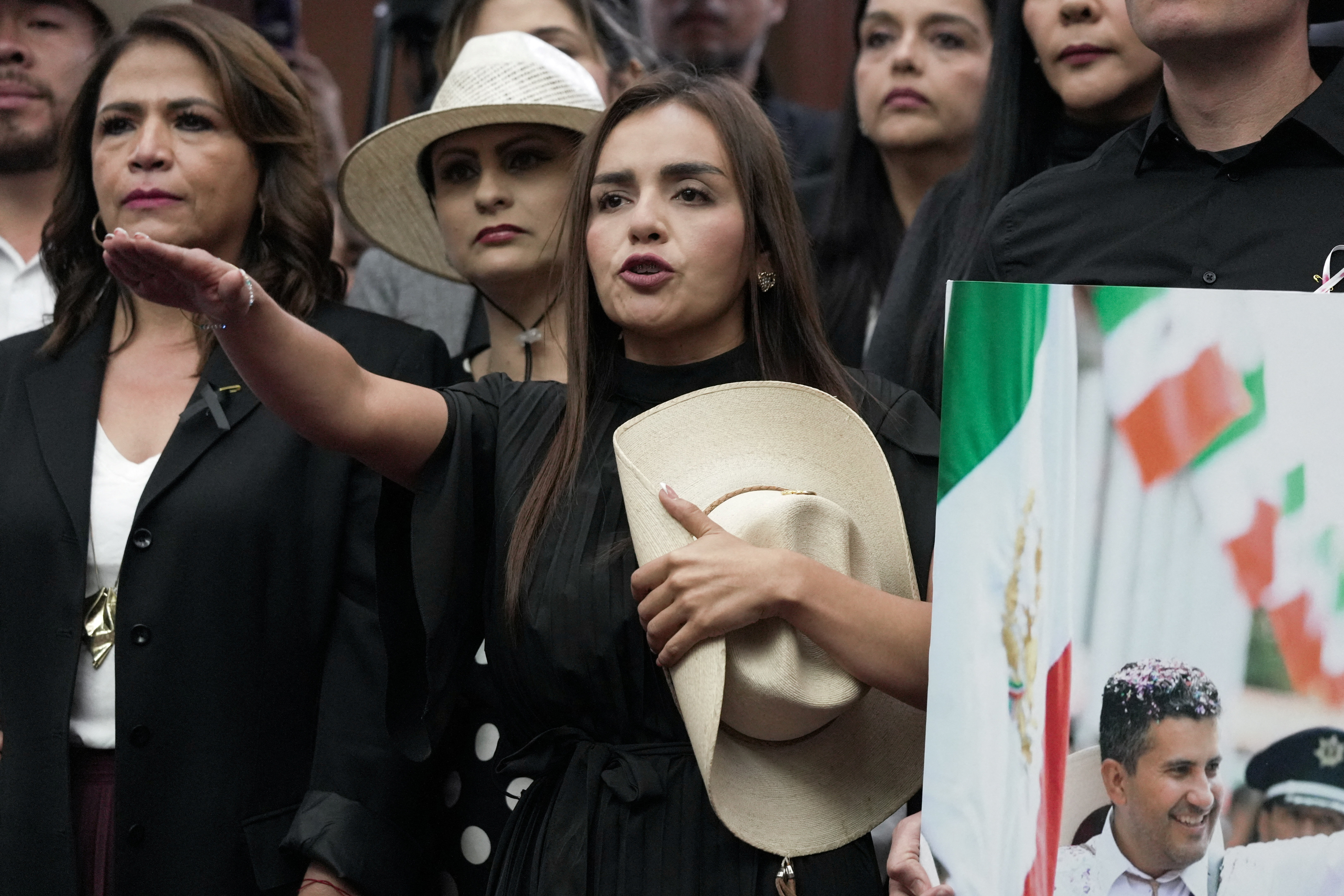 Wife of assassinated Mexican mayor assumes his office, vows to fight cartels
