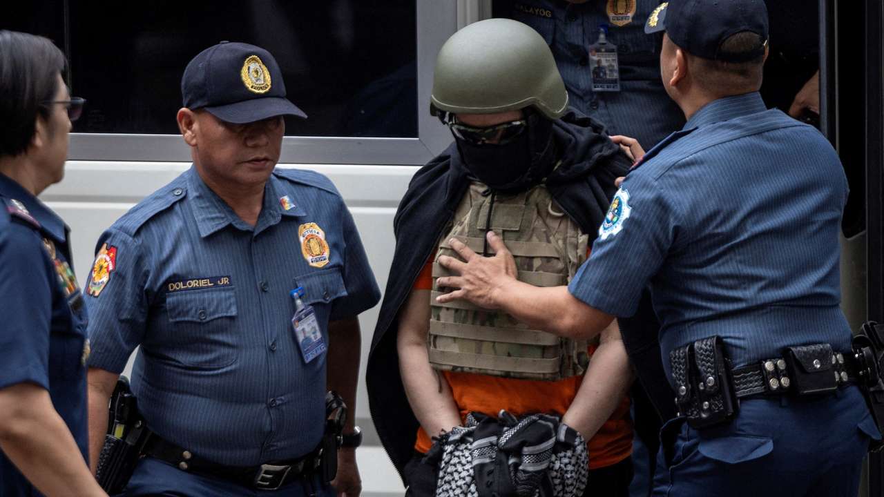 Filipino celebrity pastor Apollo Quiboloy arrives at the Pasig Regional Trial Court for an arraignment