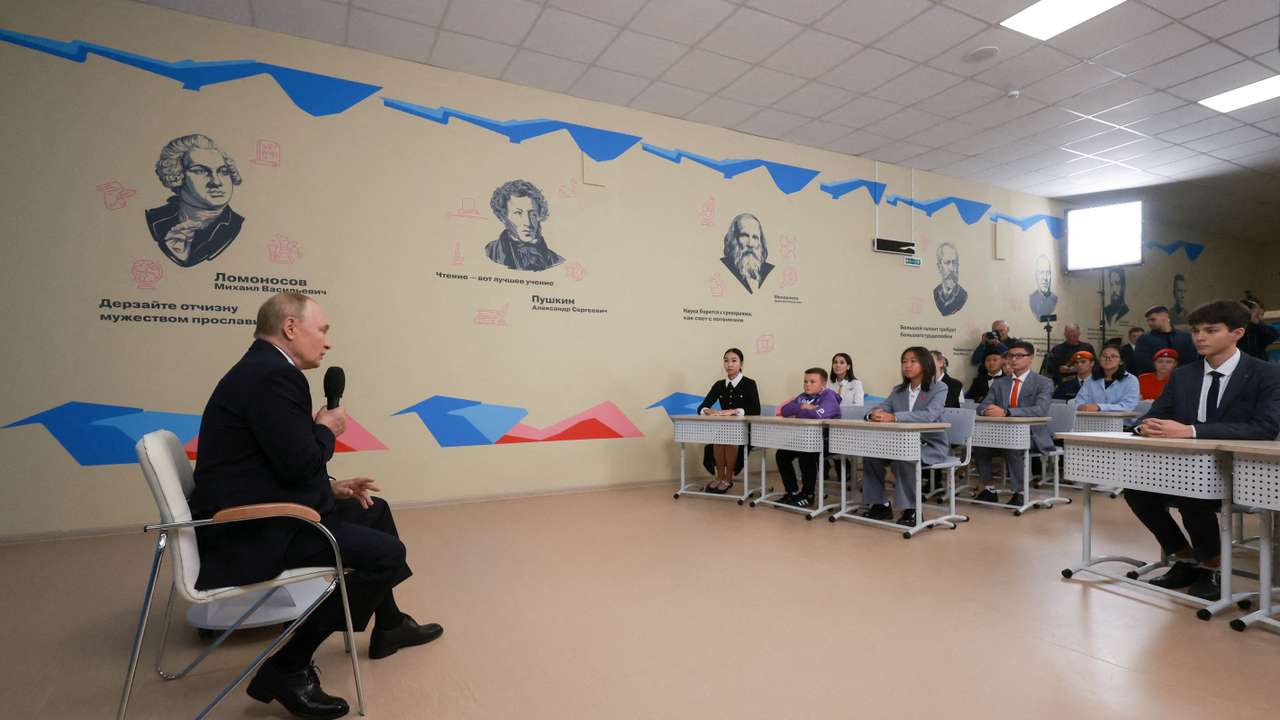 FILE PHOTO: Russian President Putin delivers a lesson at Kyzyl school