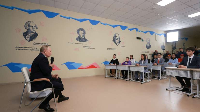 FILE PHOTO: Russian President Putin delivers a lesson at Kyzyl school