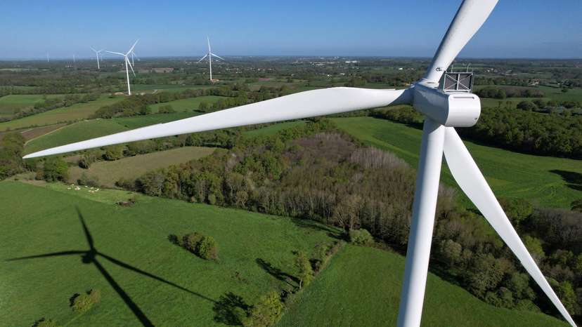 FILE PHOTO: A drone view of power-generating windmill turbines in La Regrippiere