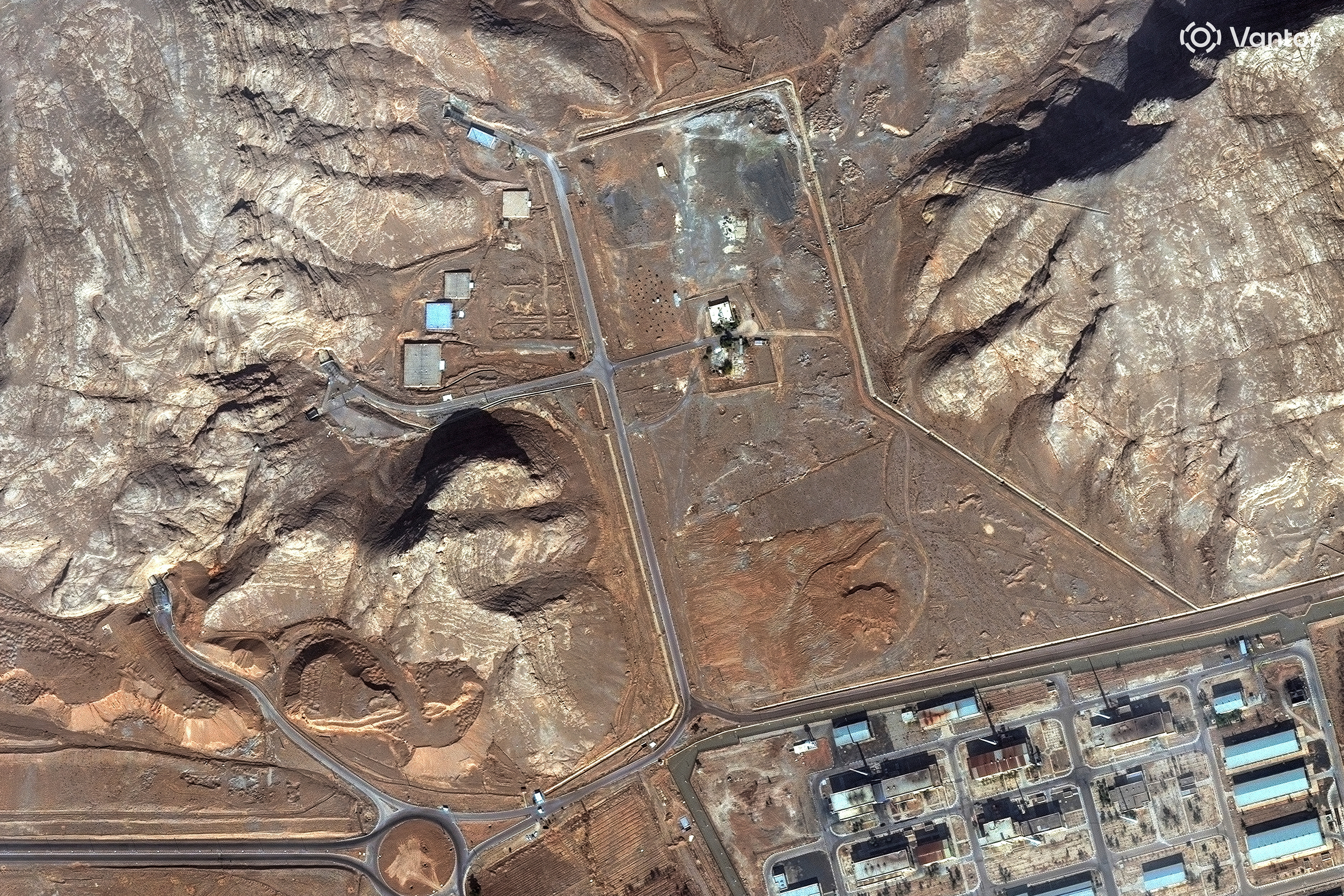 A satellite image shows un‑buried tunnel entrances at Isfahan nuclear complex