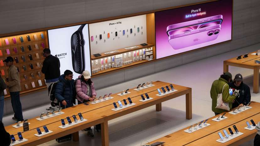 People visit Apple's Fifth Avenue store in New York City