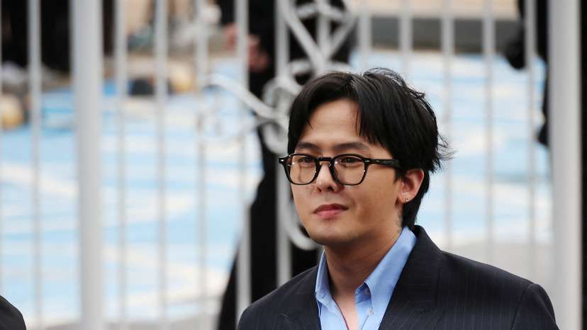 FILE PHOTO: G-dragon of K-pop group BIGBANG arrives at a police station for questioning regarding his alleged illegal drug use in Incheon