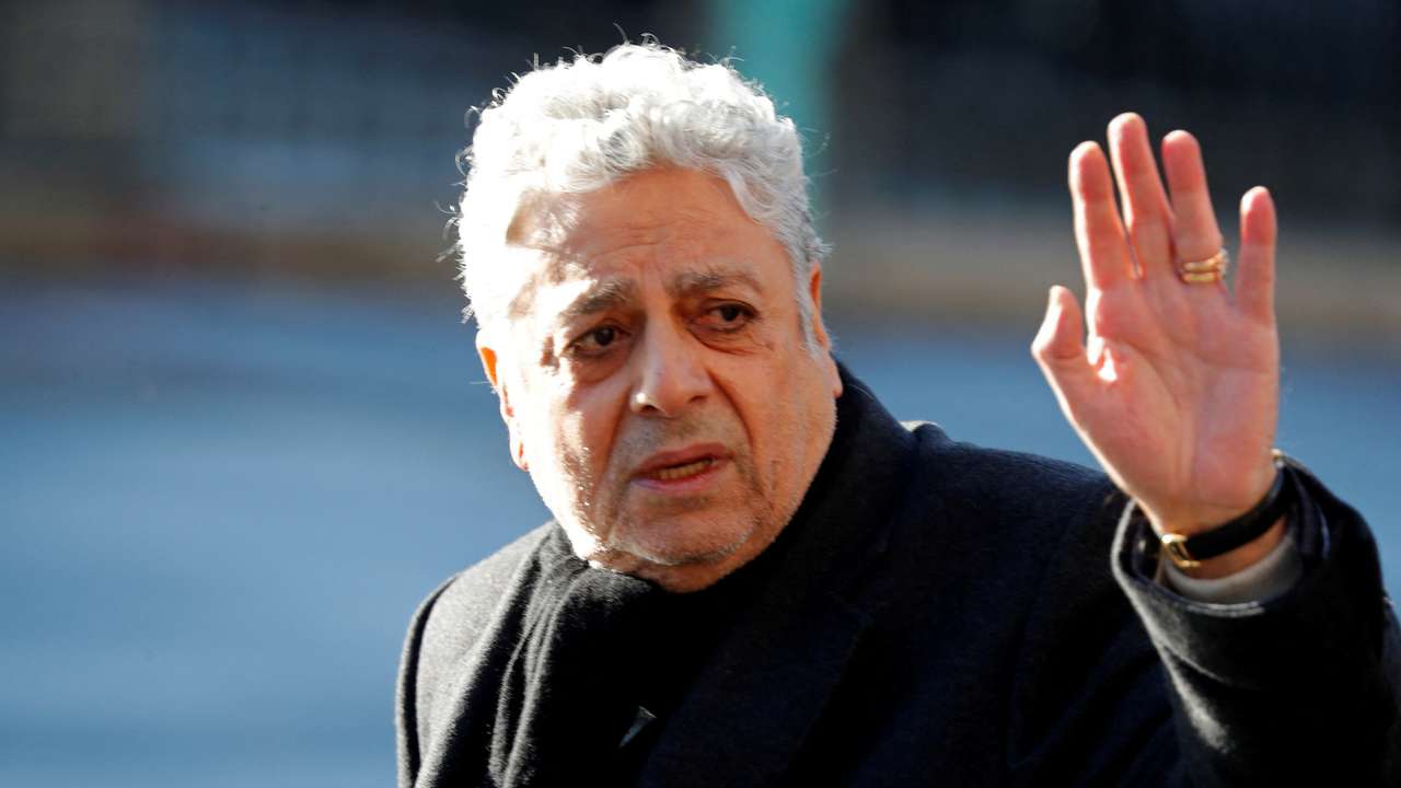 FILE PHOTO: Singer Enrico Macias arrives at the Madeleine Church to attend a ceremony during a 'popular tribute' to late French singer and actor Johnny Hallyday in Paris