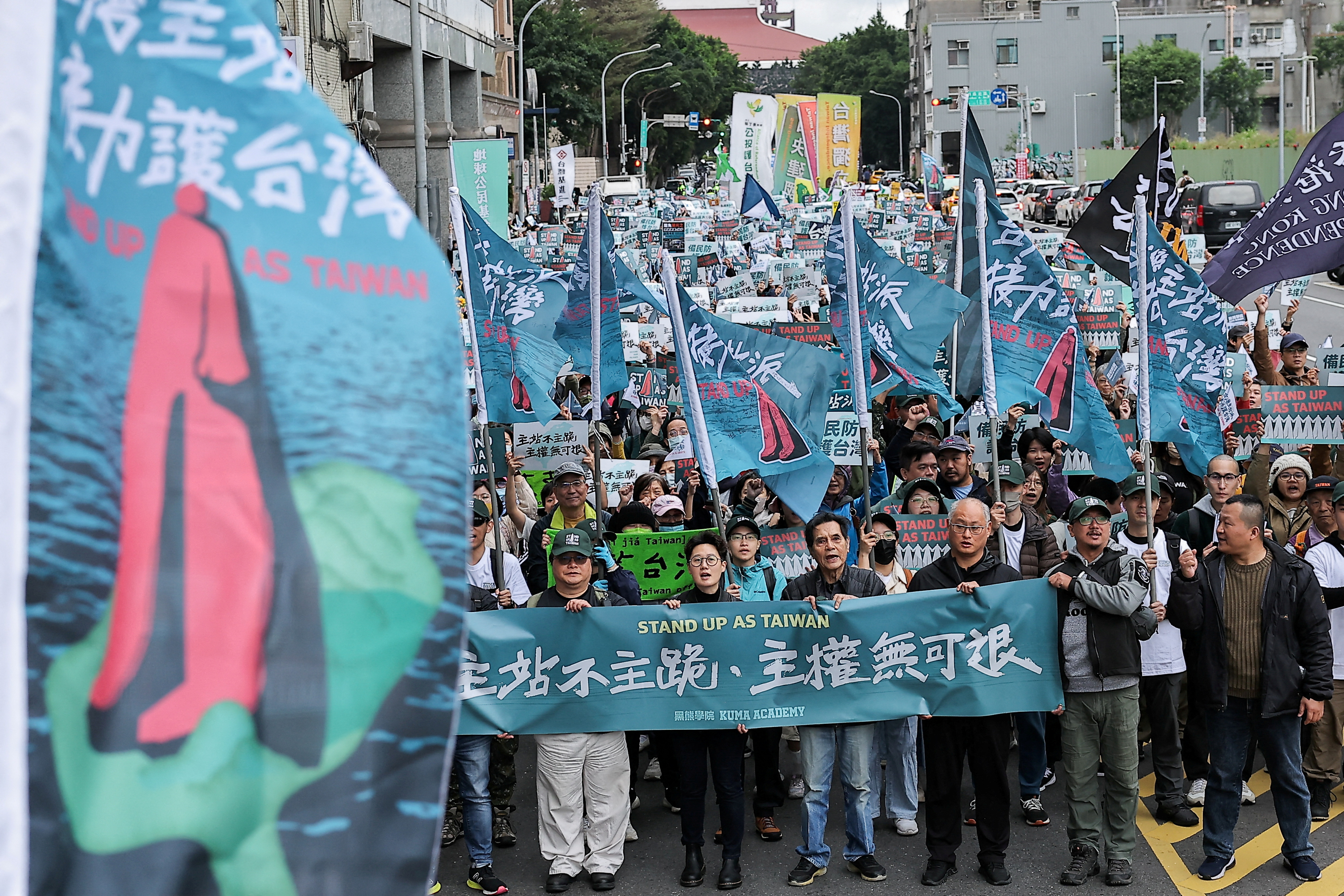 People participate in the "Stand up as Taiwan" rally in Taipei