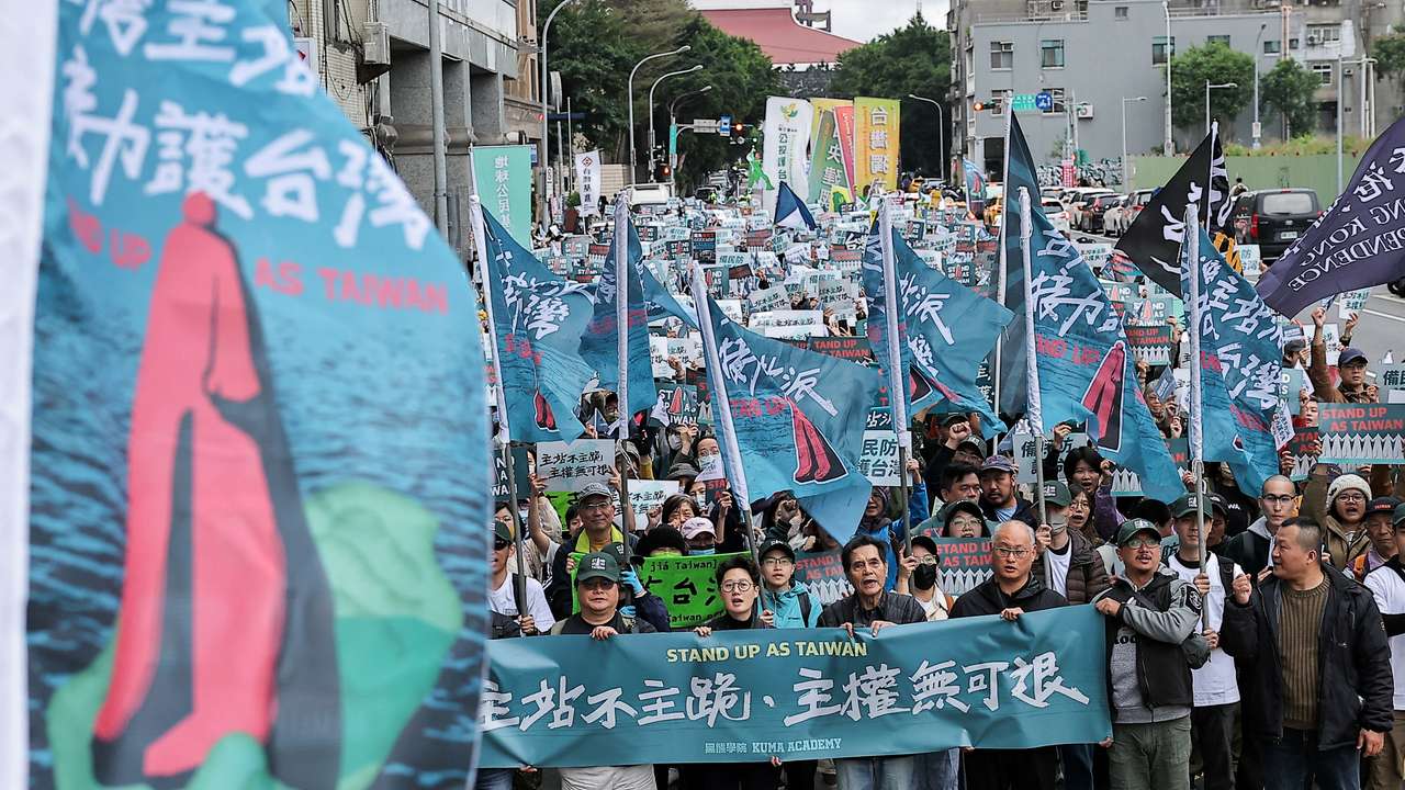 People participate in the "Stand up as Taiwan" rally in Taipei