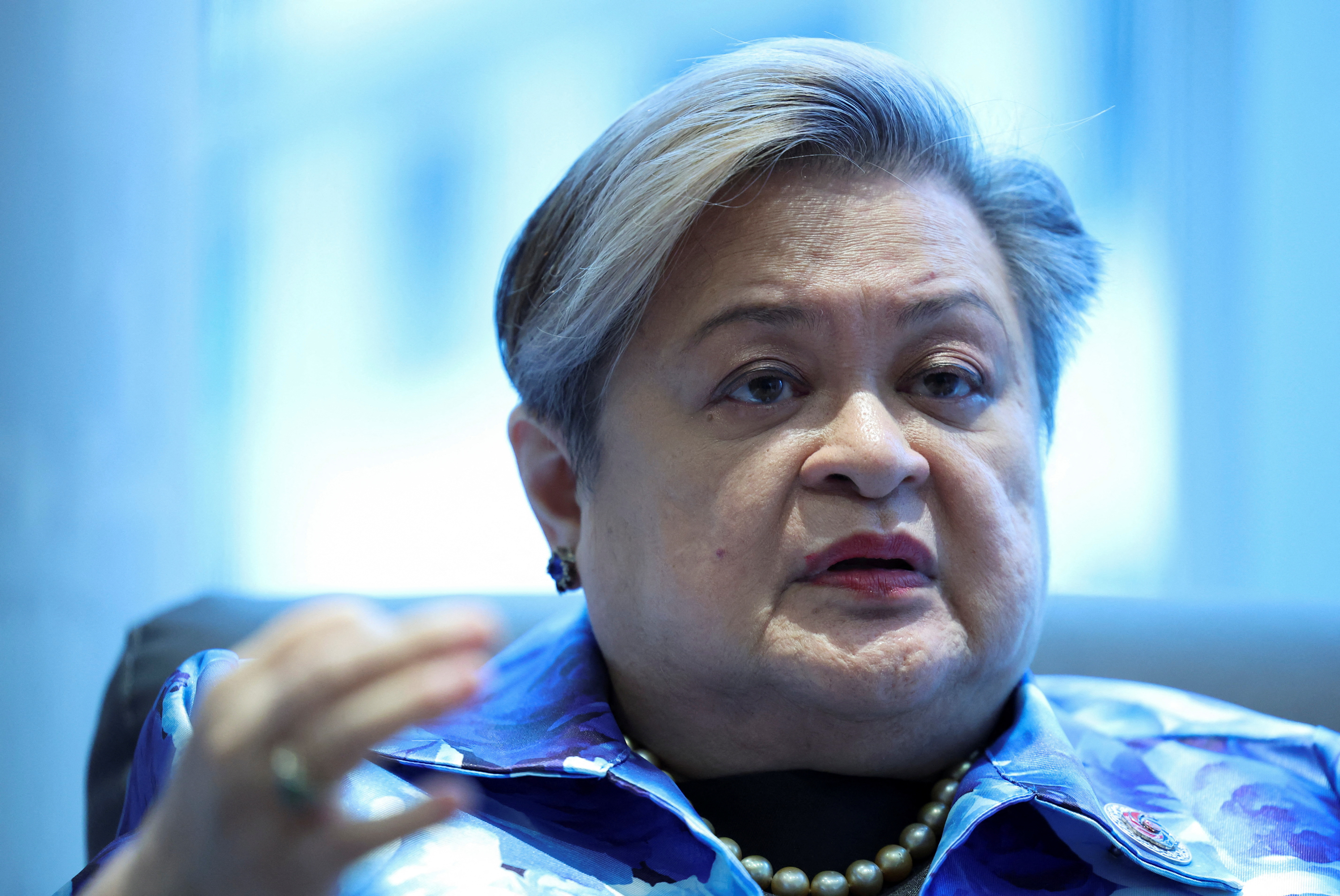 FILE PHOTO: Filipino Secretary of Foreign Affairs, Theresa P. Lazaro, speaks during an interview with Reuters