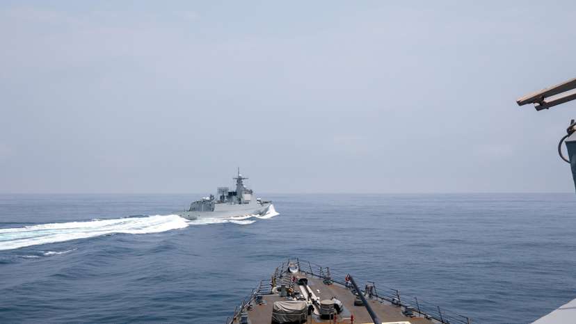 Chinese warship sails near U.S. destroyer, in the Taiwan Strait