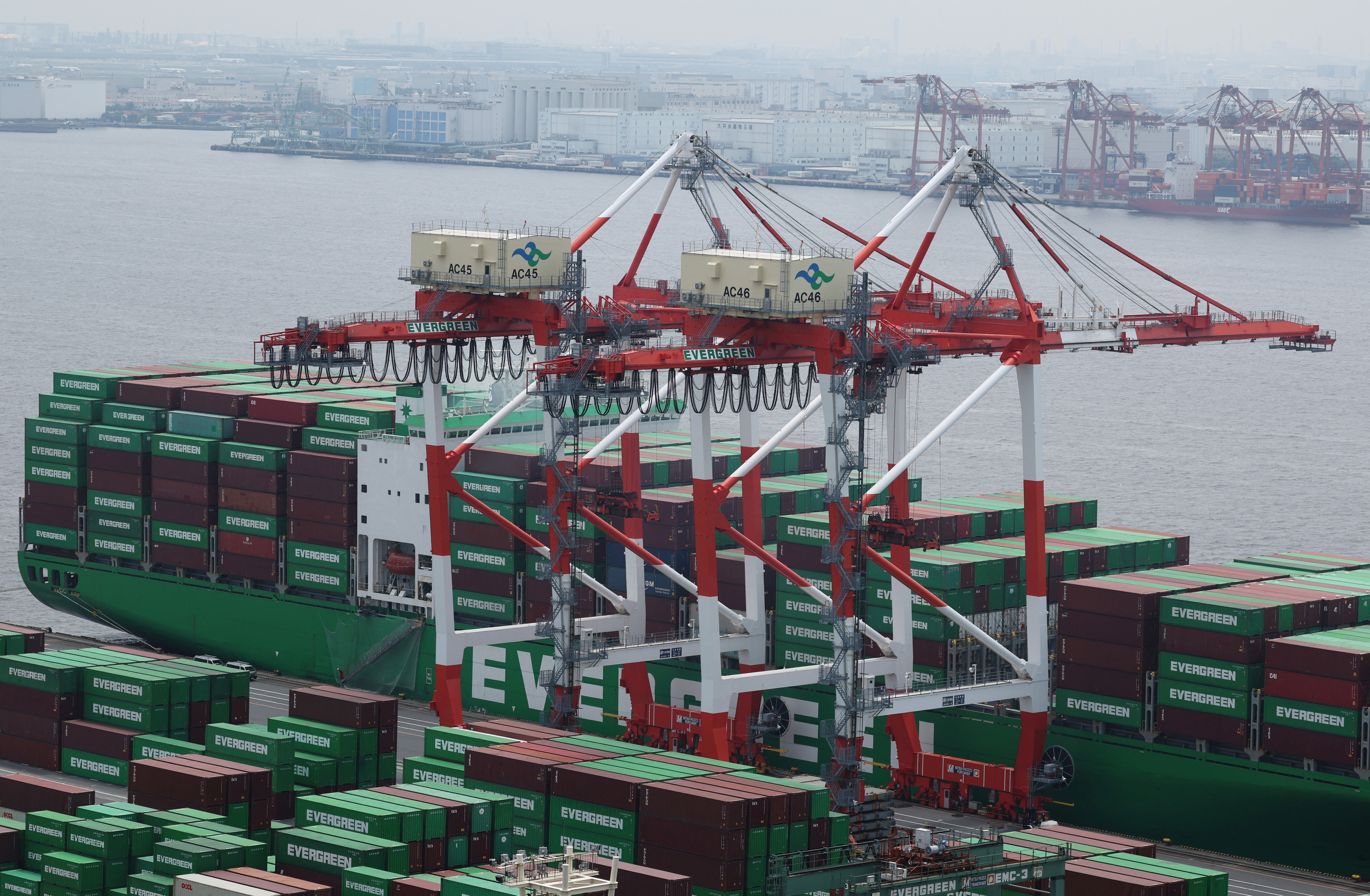 Containers are pictured at an industrial port in Tokyo