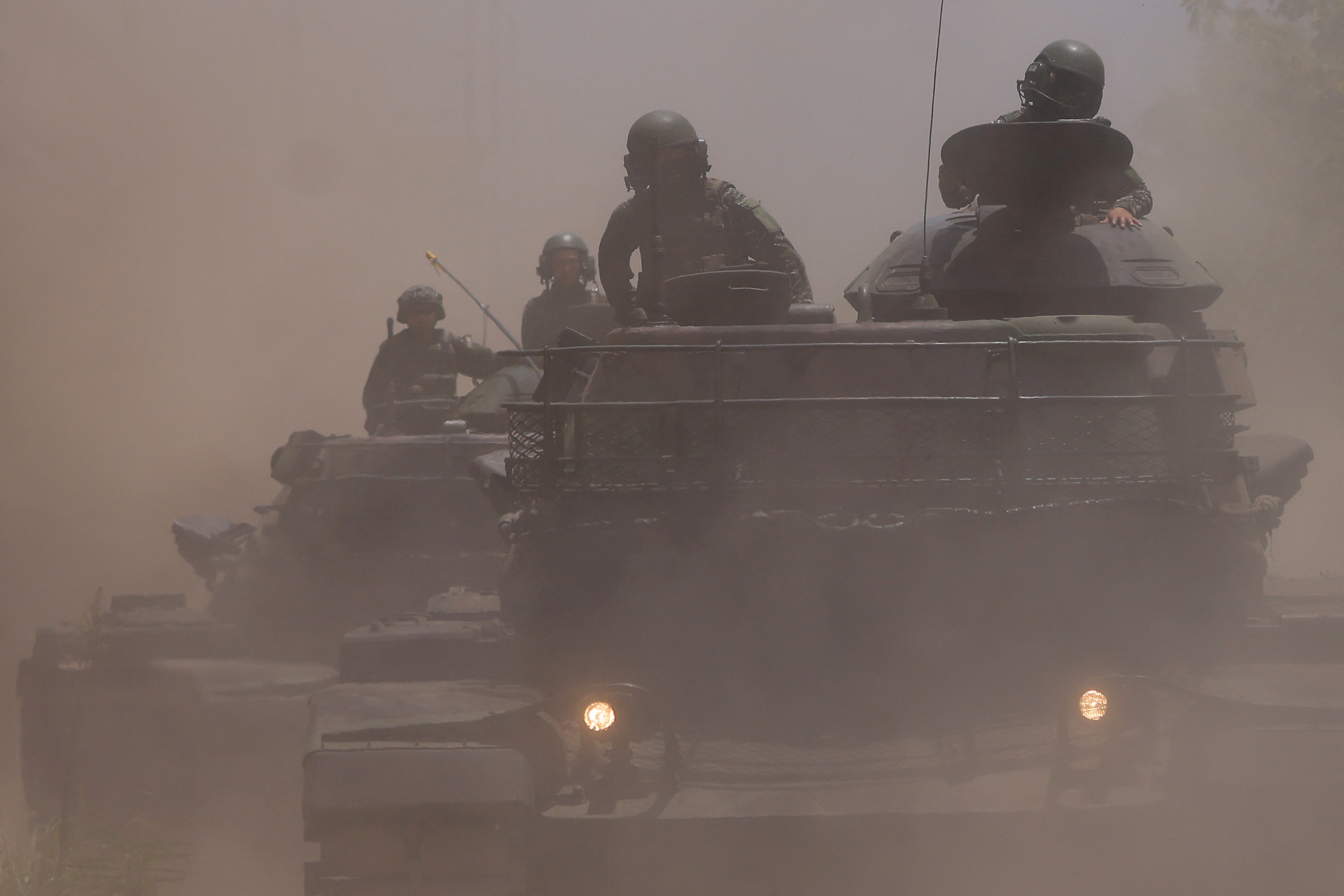 View of soldiers on top of M60A3 tanks during a drill rehearsal in New Taipei City
