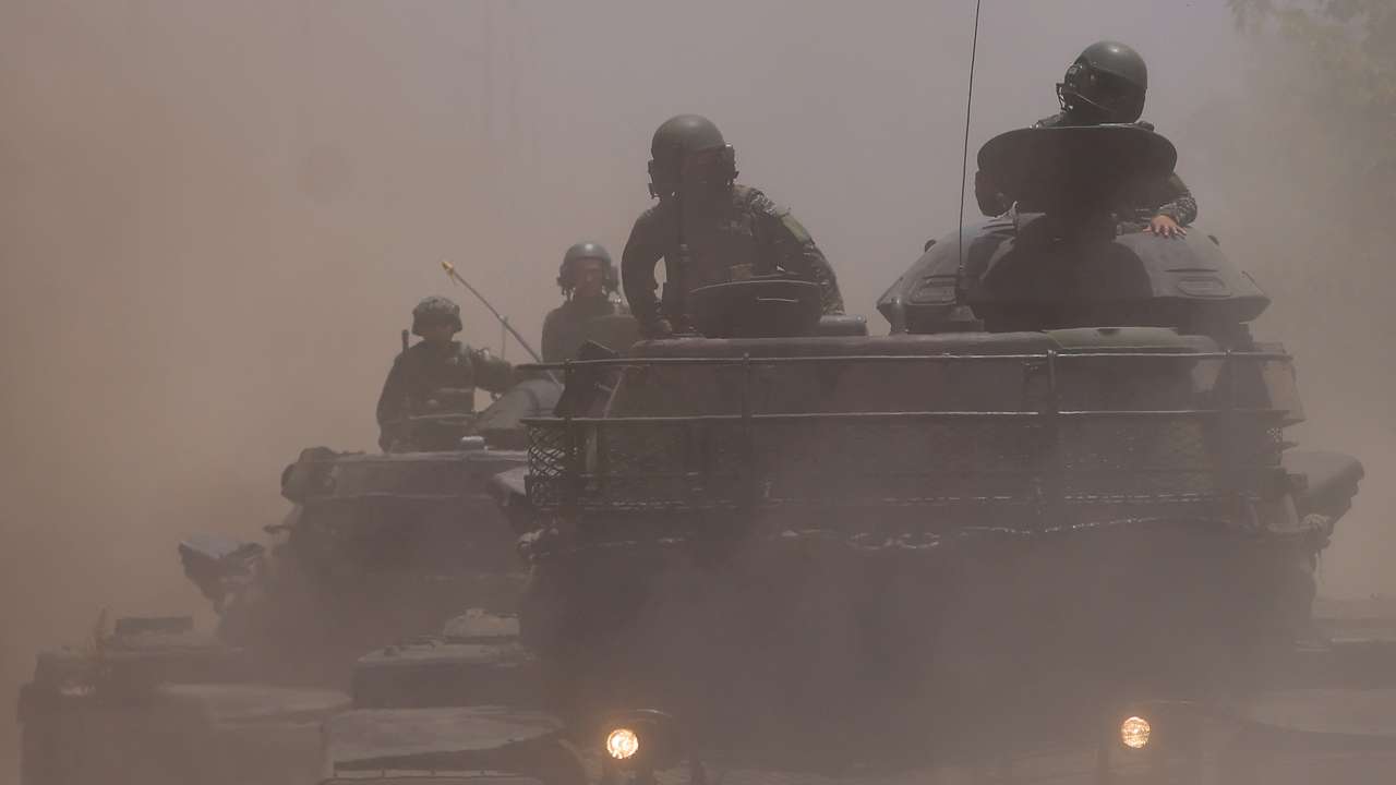 View of soldiers on top of M60A3 tanks during a drill rehearsal in New Taipei City