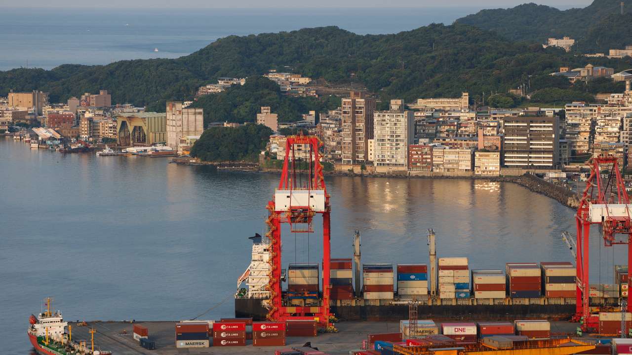 Containers and equipment sit at the Port of Keelung