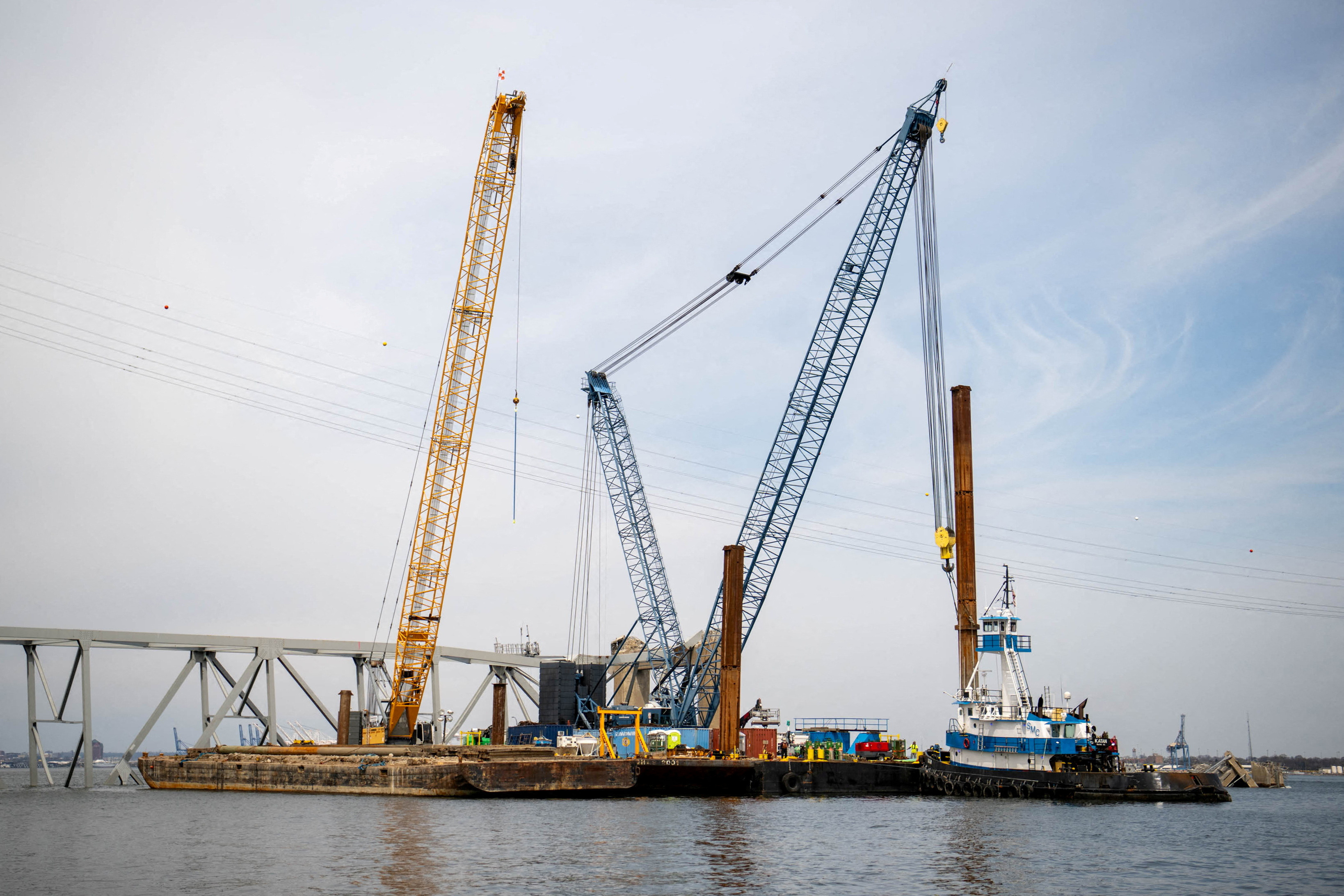 FILE PHOTO: Barge cranes are shown near the collapsed Francis Scott Key Bridge in Baltimore