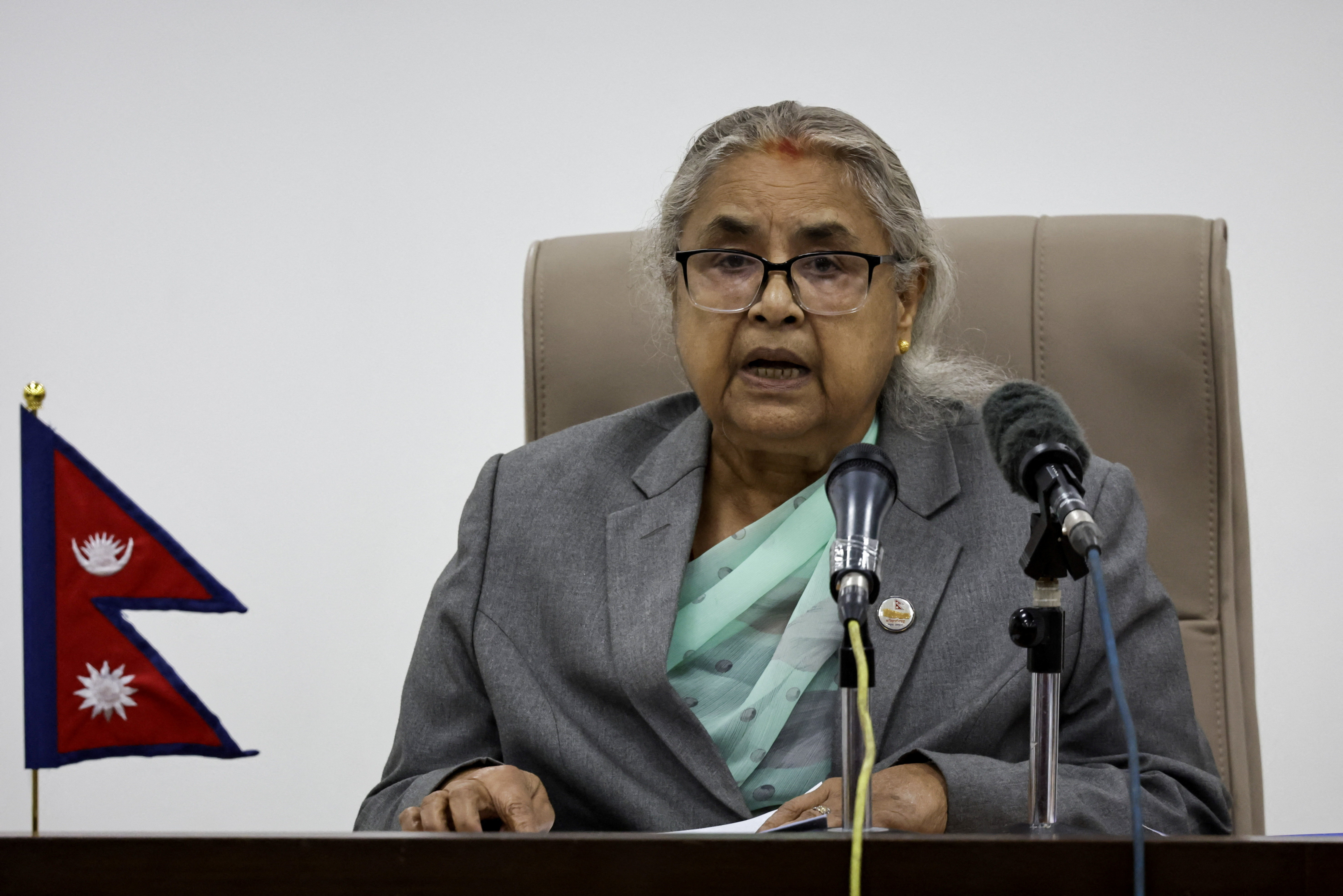 Nepal's interim Prime Minister Sushila Karki speaks as she addresses the nation from her office in Kathmandu