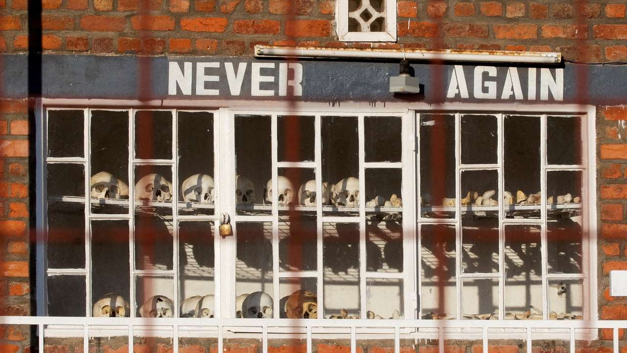 FILE PHOTO: Skulls of people who died during the 1994 Rwandan genocide are arranged and locked outside the St. Pierre Catholic Church, in Kibuye, Karongo city center, Karongi distric