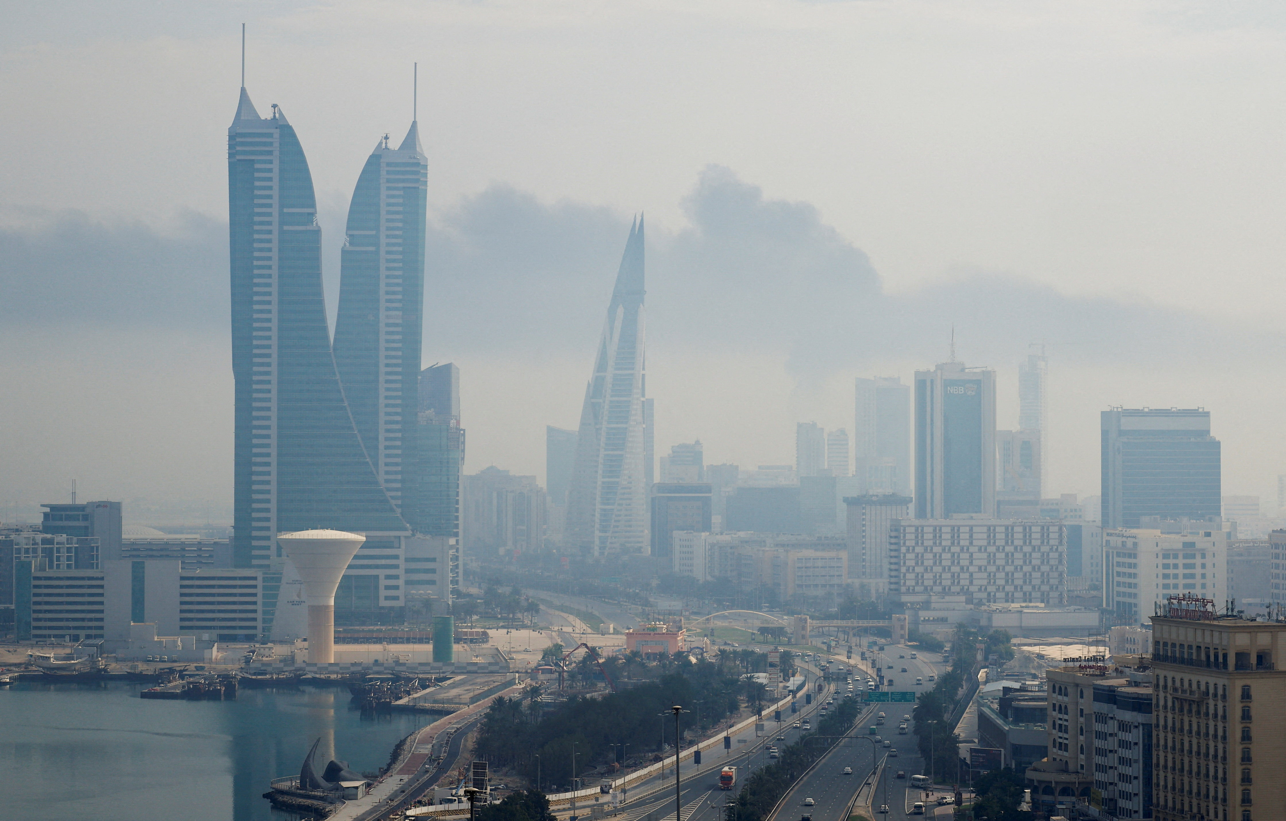 Smoke rises following a strike on Bahrain airport on Muharraq Island