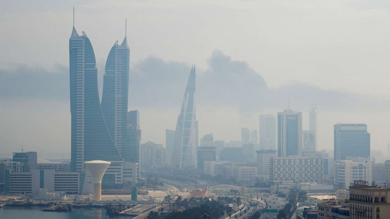 Smoke rises following a strike on Bahrain airport on Muharraq Island