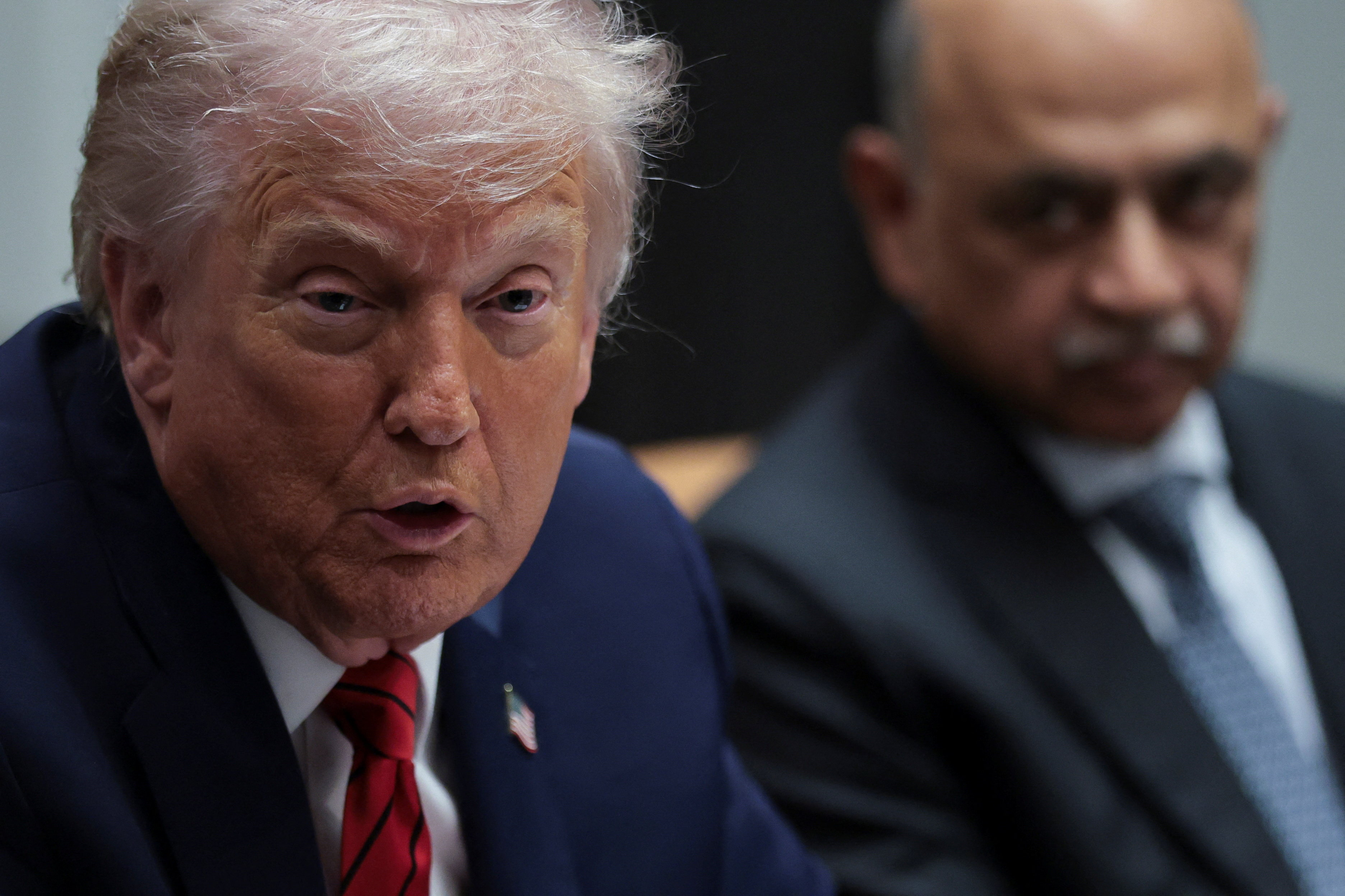 U.S. President Trump participates in a roundtable discussion with business leaders, at the White House