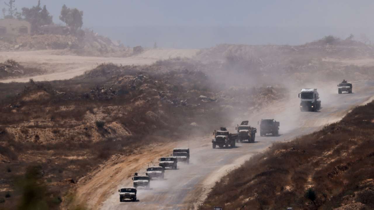 An Israeli military convoy moves inside the Gaza Strip