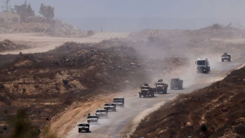An Israeli military convoy moves inside the Gaza Strip