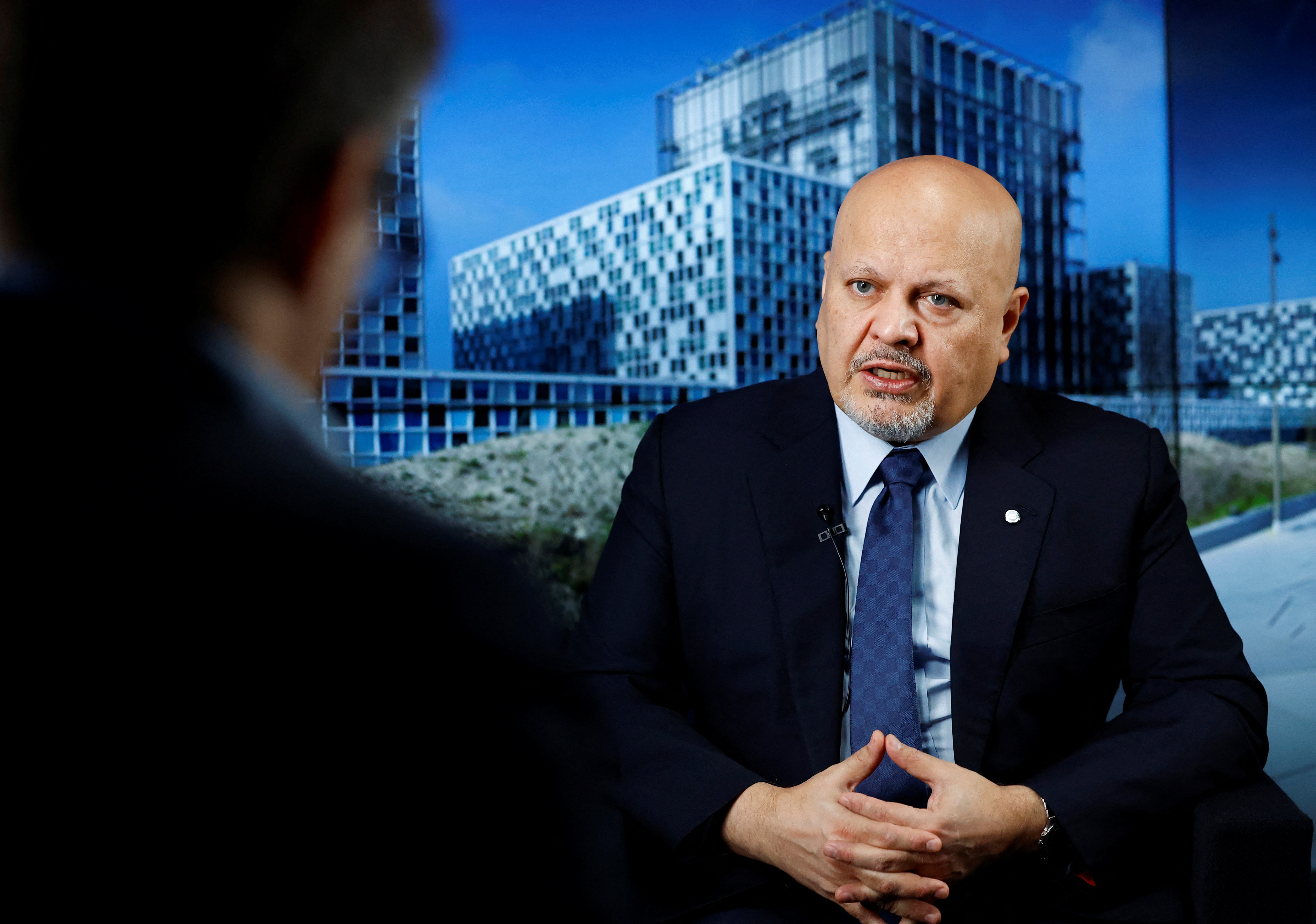 International Criminal Court (ICC) Prosecutor Karim Khan talks during an interview with Reuters